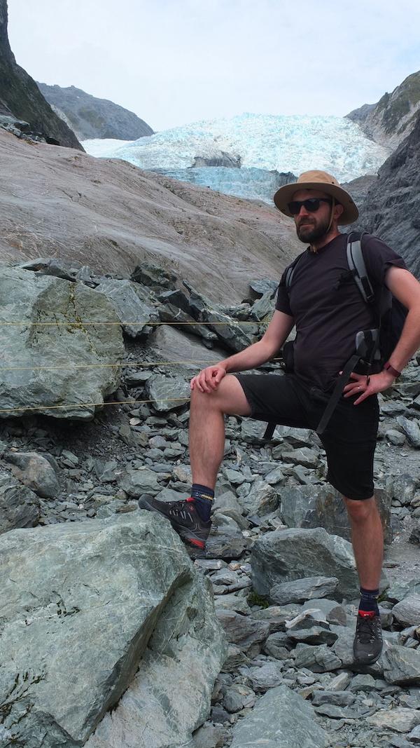 Oliver in front of Franz Josef Glacier in New Zealand