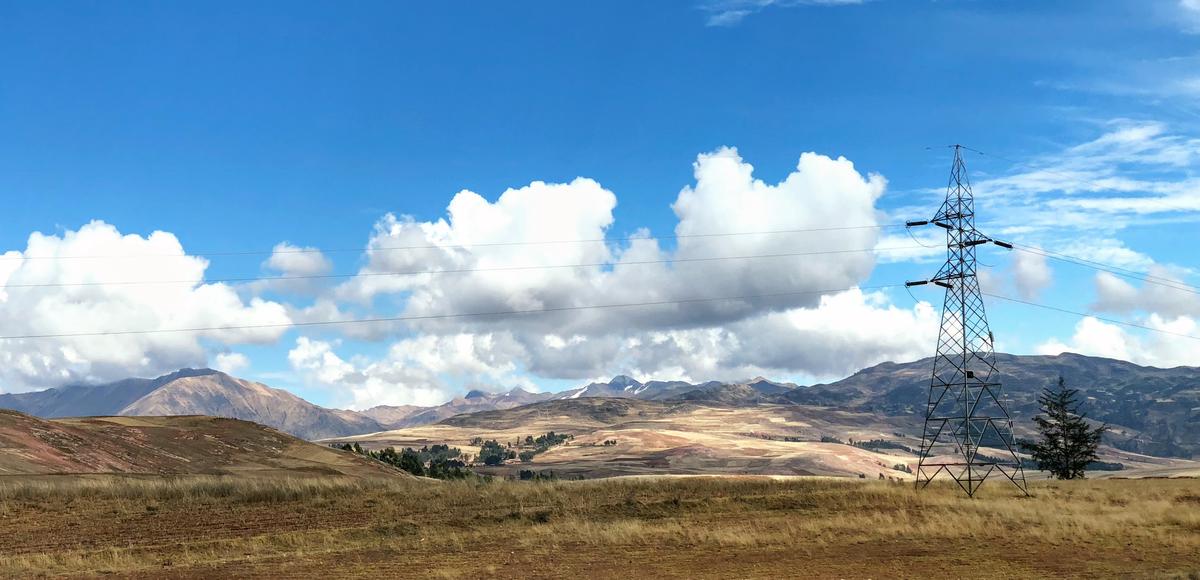 High voltage towers in Peru near the Andes. Photo credit: Laura Gillen