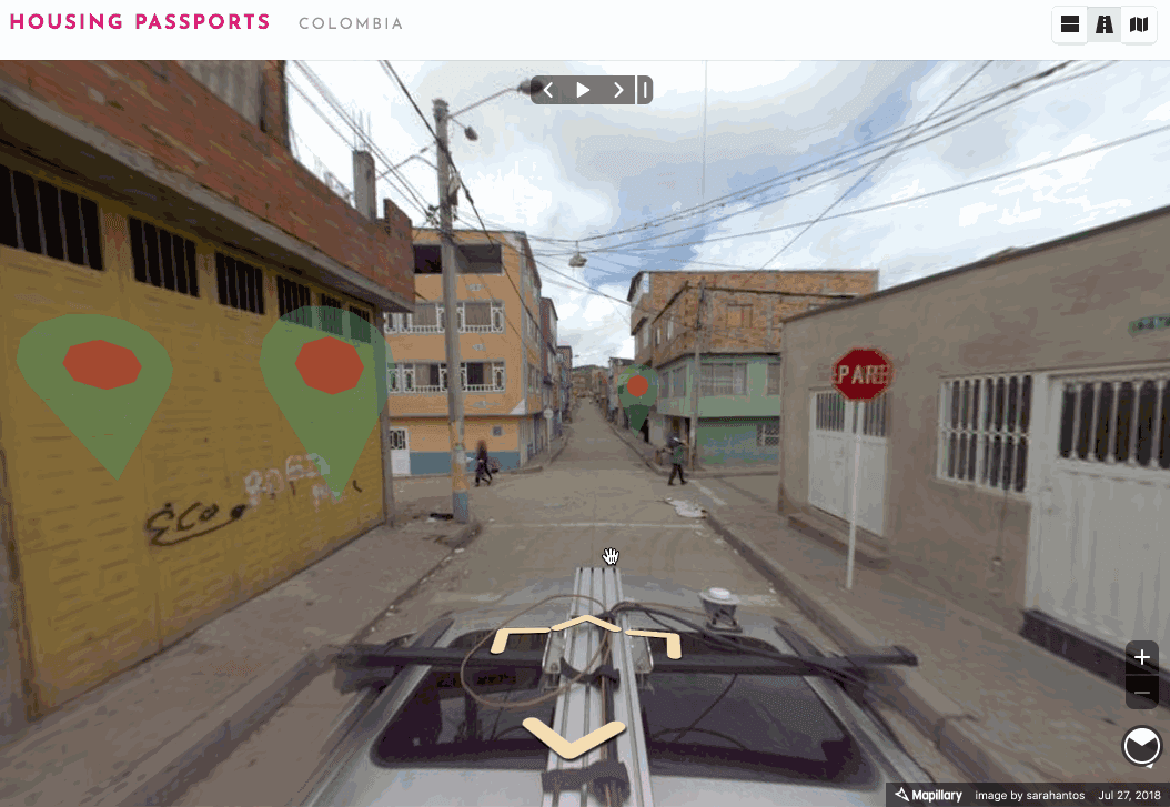 Figure 4. Our web tool combines street view navigation with ML-derived housing information. The animation shows how to navigate through our pilot region (in Colombia) and open the “Housing Passport” pane containing building information and risks.