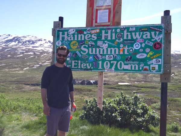 Edward infront of haines highway summit sign