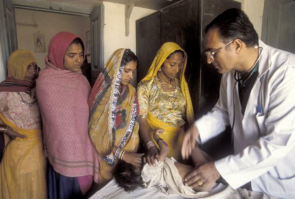 Infant patient gets a check up in India