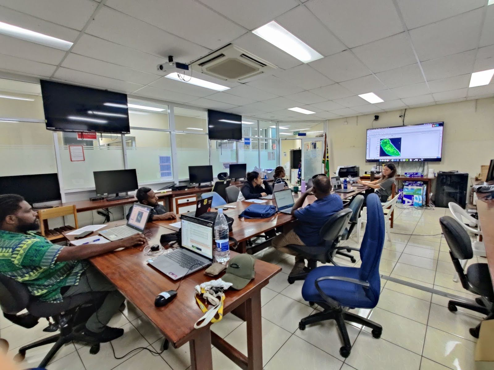 Lilly presenting on the soil health lesson to a group of VBoS staff.